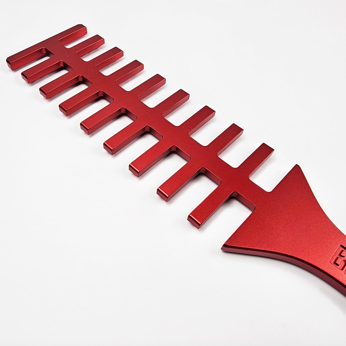 Red Steel Spanking Paddle with studs made by Brat Breakers