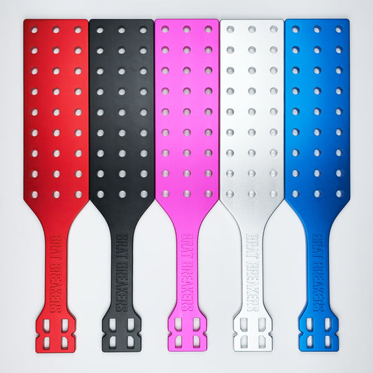 Collection of Spanking Paddles made by Brat Breakers in five different colours