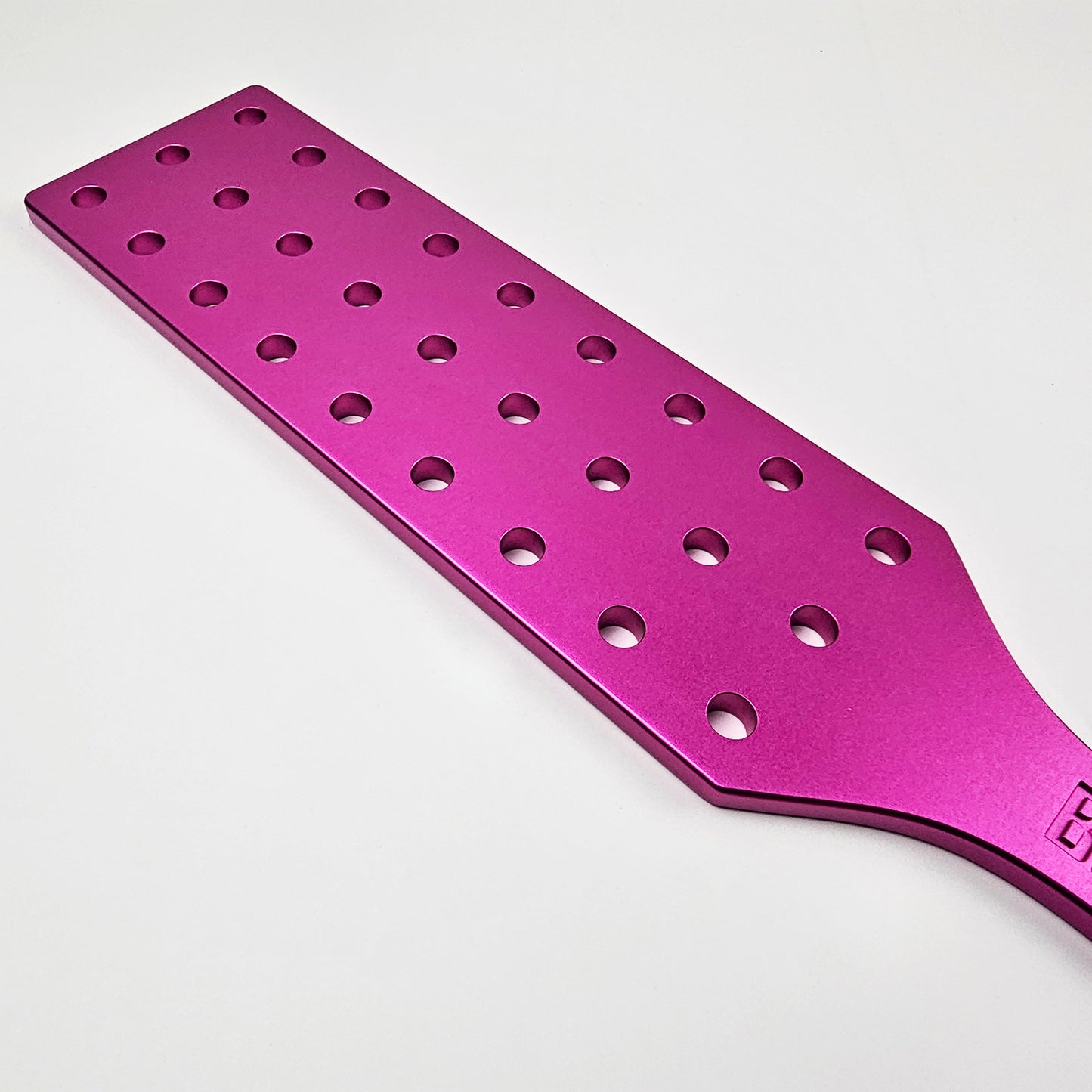 Pink Steel Spanking Paddle with holes made by Brat Breakers
