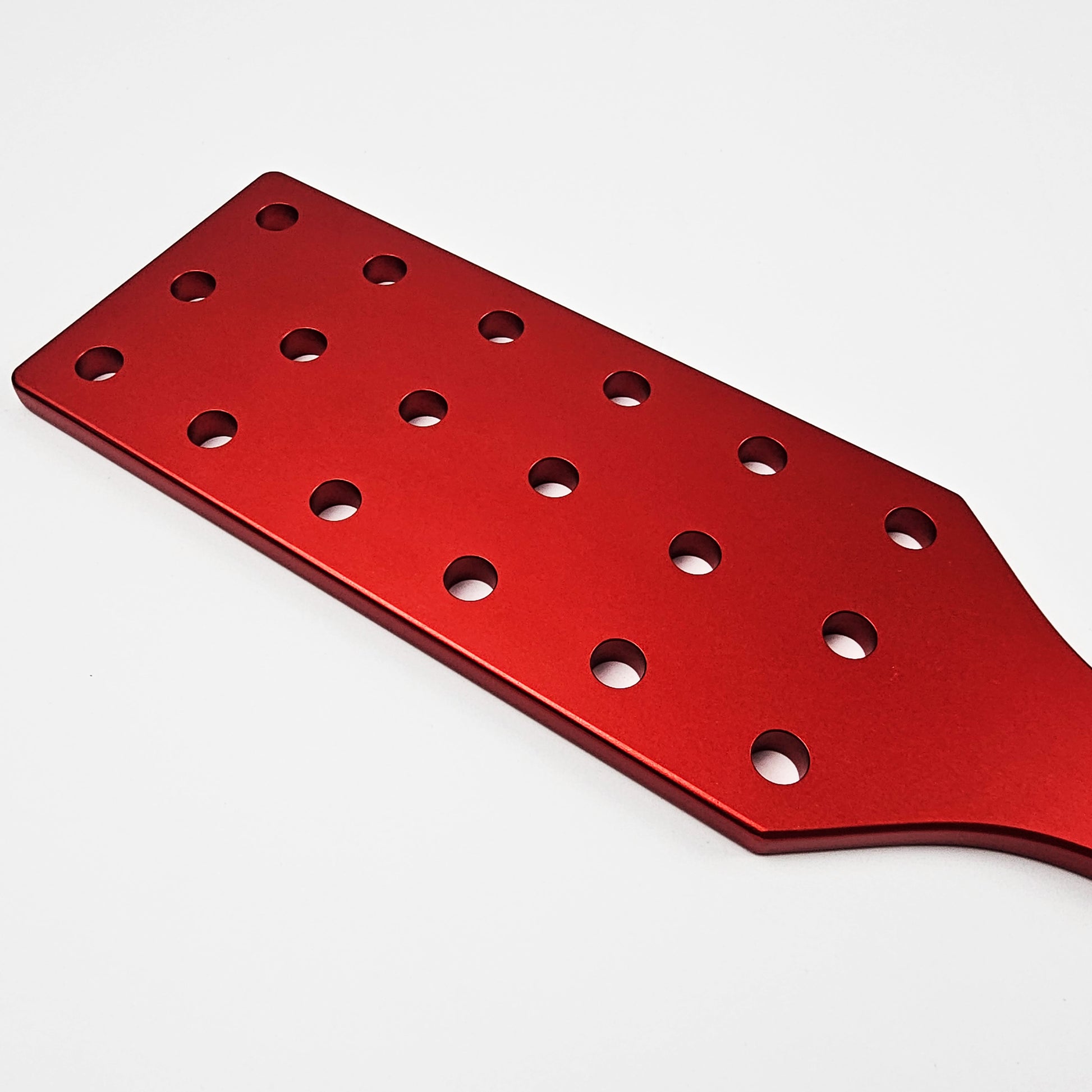 Red Steel Spanking Paddle with holes made by Brat Breakers