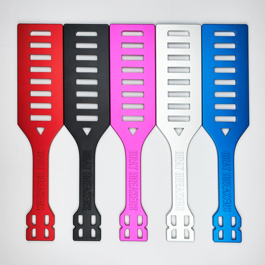 Collection of Spanking Paddles made by Brat Breakers in five different colours