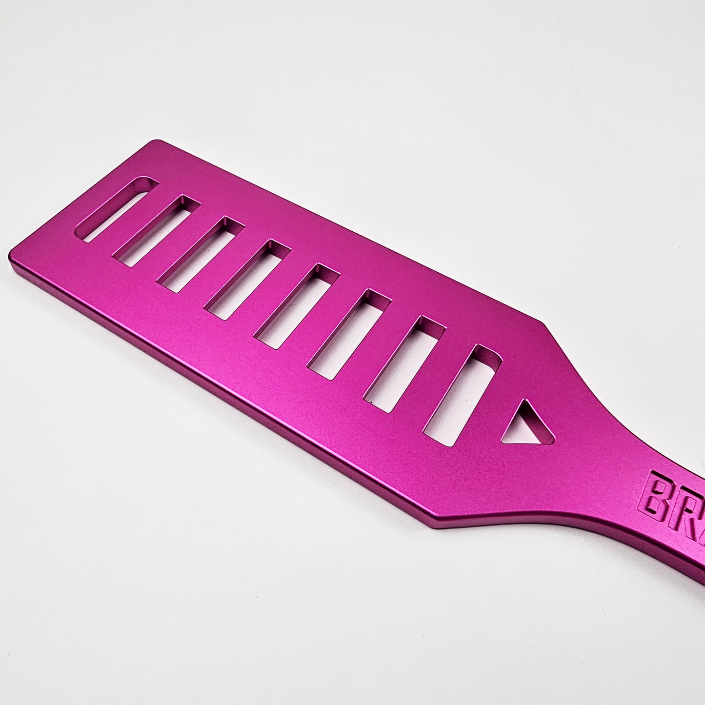 Pink Steel Spanking Paddle with holes made by Brat Breakers