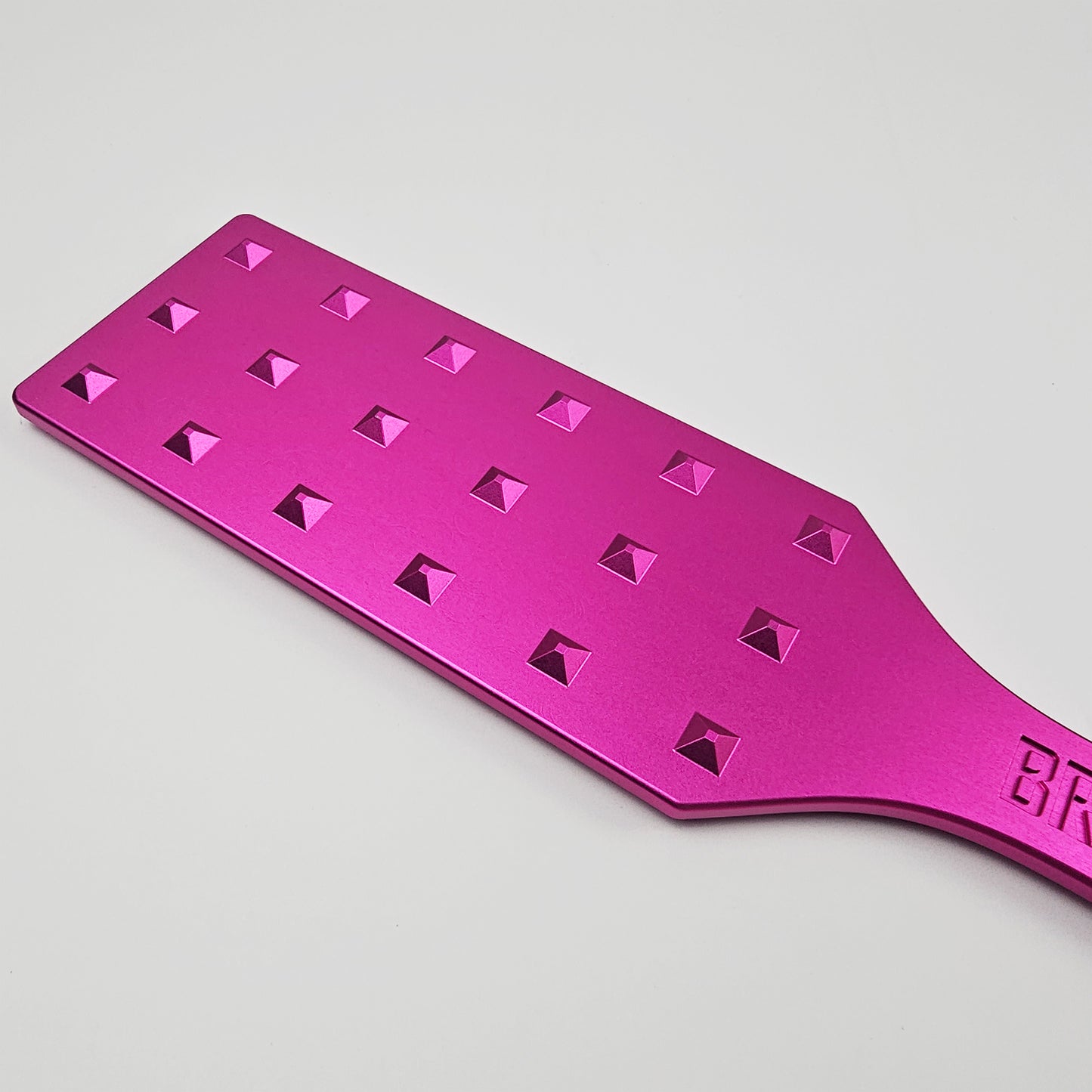 Pink Steel Spanking Paddle with studs made by Brat Breakers