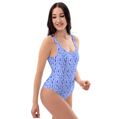 One-Piece Swimsuit - Toy Lyf in blue patterned fabric modeled by a woman from Brat Breakers Swimwear and All Clothing collections