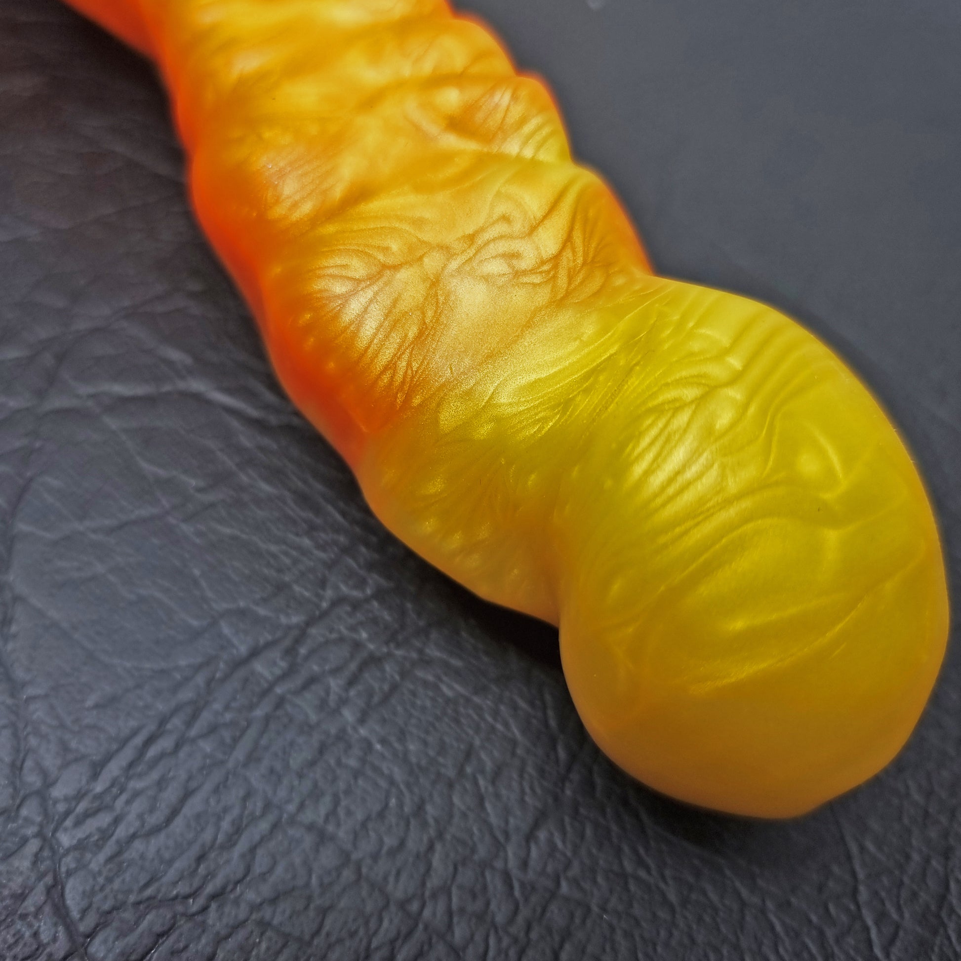 Brat Breakers Draggin' dildo. Yellow and orange up close